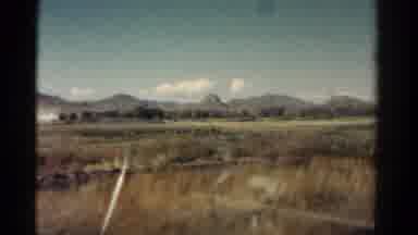 Colorado USA (1967): A Panning Shot From Behind A Train Window Of A Mountain Range