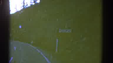 Colorado USA (1967): Two-Lane Highway Curve Featuring "Danger" Sign And Forested