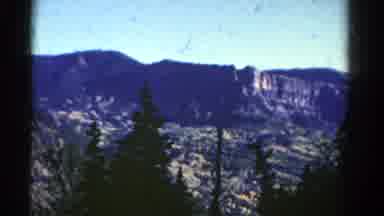 Colorado USA (1967): Scenic View Of Cliffs In The Distance Filmed Through The