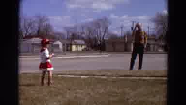 Detriot Michigan (1967): Small Cowgirl Playing Kickball With Man