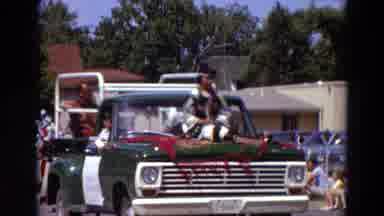Detriot Michigan (1967): Indian Lady Sits On The Hood Of Green Truck In Parade