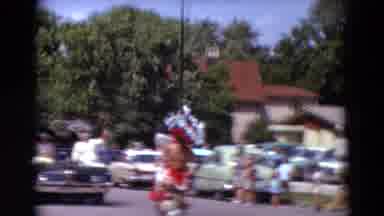Detriot Michigan (1967): Man In A Costume With A Large Headdress Dances Down