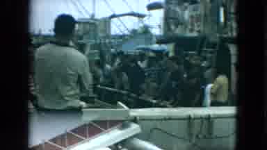 Florida (1967): Boy Takes Something From His Father Who Passes It To Him From The