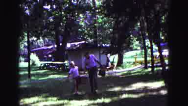Galena Illinois USA (1967): Man And Child Together Carry Baskets While Men Women