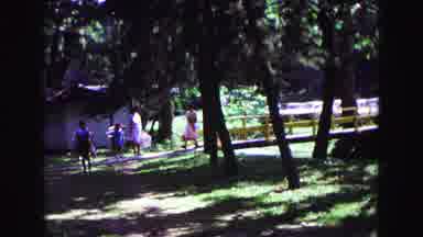 Galena Illinois USA (1967): Man Woman And Children All Carrying Bags Through