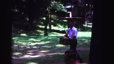 Galena Illinois USA (1967): Man Carrying A Box Boy Throwing A Ball To Woman In