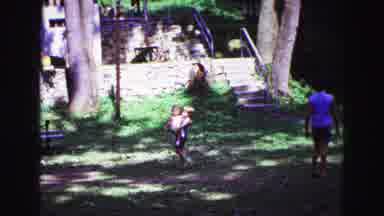 Galena Illinois USA (1967): One Boy Carrying A Kid And Some Boys Are Enjoying