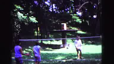 Galena Illinois USA (1967): Boys And Girls Play Volleyball In A Wooded Area In The