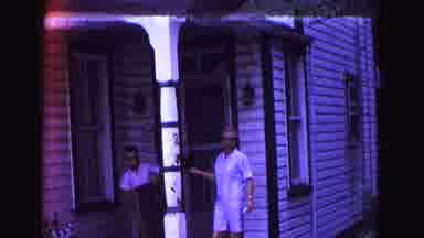 Galena Illinois USA (1967): Family Helps Dad Load Car By Handing Him Chairs While