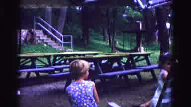 Galena Illinois USA (1967): Girl And Other Adults Hanging Out Outside At The Table