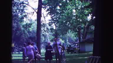 Galena Illinois USA (1967): Old Video Of People Outdoors In Park Carrying Chairs