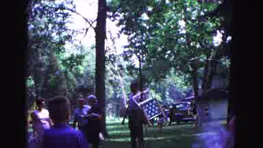 Galena Illinois USA (1967): People Setting Up Lawn Chairs And Lighting A Fire
