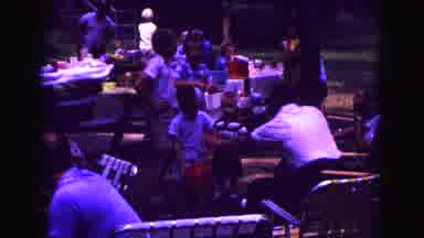 Galena Illinois USA (1967): Man Plays With Child And Balloon As Other Kids Watch