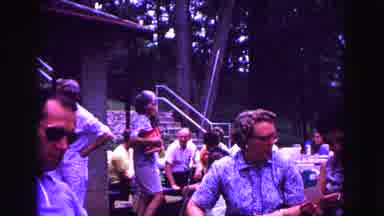 Galena Illinois USA (1967): A Group Of People Interacting With Each Other In A