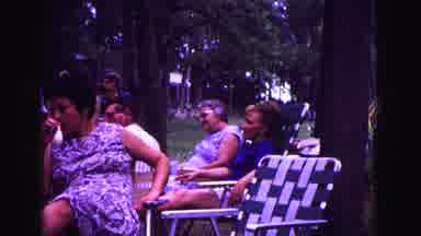 Galena Illinois USA (1967): A Group Of Women Sit Outside Together On Lawn Chairs
