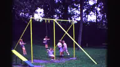 Galena Illinois USA (1967): Video Of Children Playing On A Swing Set In The Garden