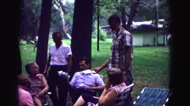 Galena Illinois USA (1967): Group Of People Standing Sitting And Talking At The