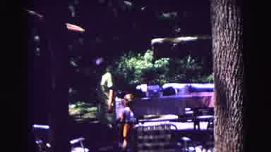 Galena Illinois USA (1967): A Small Boy Trying To Interact With His Grandmother