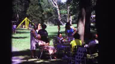 Galena Illinois USA (1967): People Gathered Together Talking And Sitting In Chairs