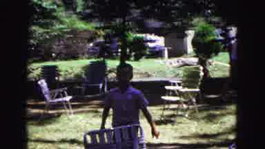 Galena Illinois USA (1967): Little Boy Walks Up To The Camera And Smiles As He