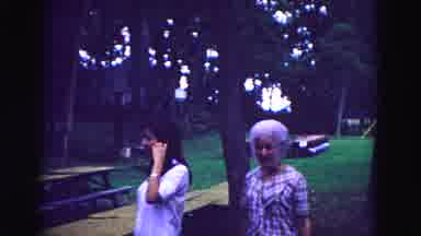 Galena Illinois USA (1967): Two Women Wait As People Bring Items To Picnic Tables