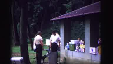 Galena Illinois USA (1967): Group Of People Having A Large Picnic In A Brick