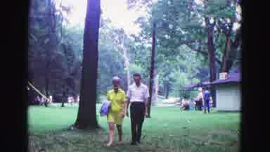 Galena Illinois USA (1967): Man Walks With Woman In Park On Pleasant Day For