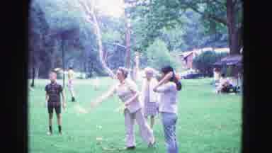 Galena Illinois USA (1967): Small Group Playing Tossing Game In Park Surrounded By