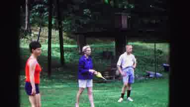 Galena Illinois USA (1967): Adults Enjoying A Game Of Darts In The Backyard For
