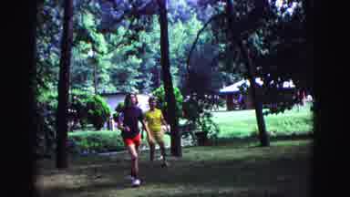 Galena Illinois USA (1967): Family Outside Playing Tennis Together In The Garden