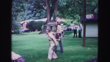Galena Illinois USA (1967): Parents And Children Play Lawn Darts Game In The Yard