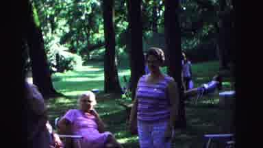 Galena Illinois USA (1967): People Outside Sitting In Lawn Chairs And Standing