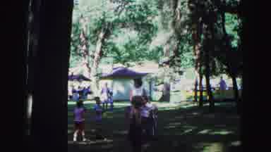 Galena Illinois USA (1967): Mother And Children Talking At Outdoor Festival Near