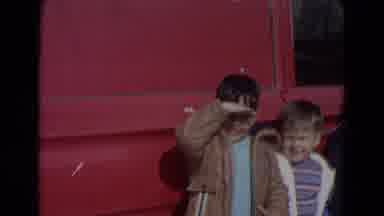 Lincoln Nebraska (1967): Three Young Boys Standing Near Red Car Man Holding Boy