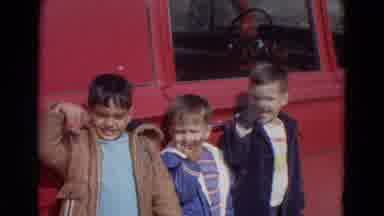 Lincoln Nebraska (1967): Three Boys Waving Against Red Truck