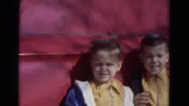 Lincoln Nebraska (1967): Children Dressed In The 80s Style Greet With Their Hand