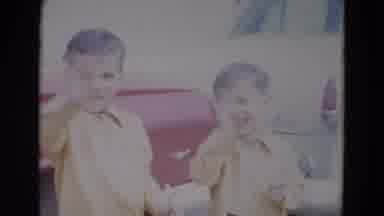 Lincoln Nebraska (1967): Two Happy Boys Waving Standing In Front Of A Red Car