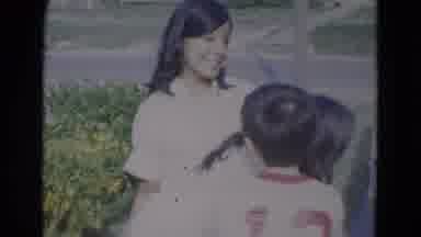 Lincoln Nebraska (1967): Three Children Having Fun Together Outside Laughing