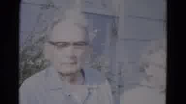 Lincoln Nebraska (1967): Footage Of An Elderly Husband And Wife Stood Outside