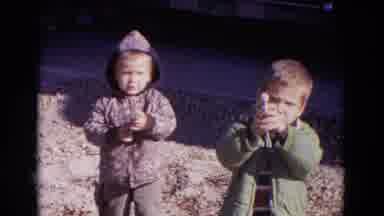 Lincoln Nebraska (1967): Two Little Boys Playing Fight With Two Fake Guns