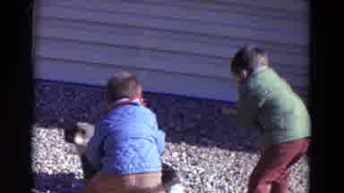Lincoln Nebraska (1967): Little Boy Pets Dog While Second Boy Shows Injured Hand
