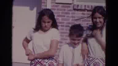 Lincoln Nebraska (1967): Two Girls And A Boy Are Dressed Up Outside Posing For