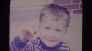 Lincoln Nebraska (1967): Two Little Boys Waving To A Camera While Smiling