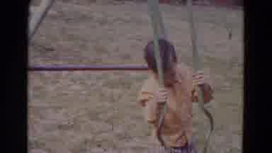 Lincoln Nebraska (1967): Little Boy In Yellow Shirt Playing On Stand Up Swing