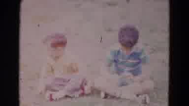 Lincoln Nebraska (1967): Male Child Swinging And Then Two Boys Sitting On Grass