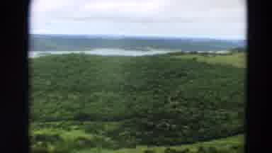 Minnesota US (1967): Vast Green Woodland By A Calm River On A Cloudy Day