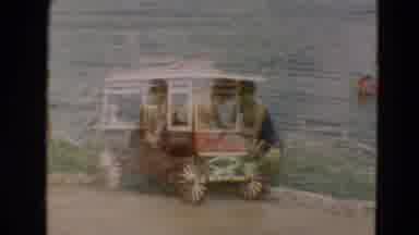 Minnesota US (1967): A Scene Of A Red Cart And People In Water