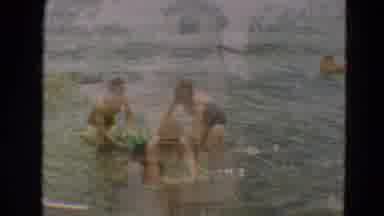 Minnesota US (1967): Video Of Three Women Swimming In Lake With One On Raft Double