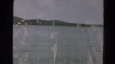 Minnesota US (1967): The View Of A Large Calm Lake Encircled By A Large Mountain