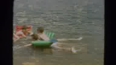 Minnesota US (1967): Groups Of Children Gathered Playing And Swimming In The Pond